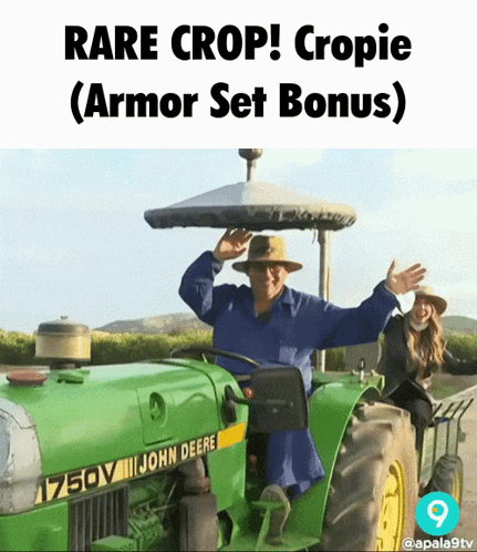 Man in Blue Shirt Driving John Deere Tractor