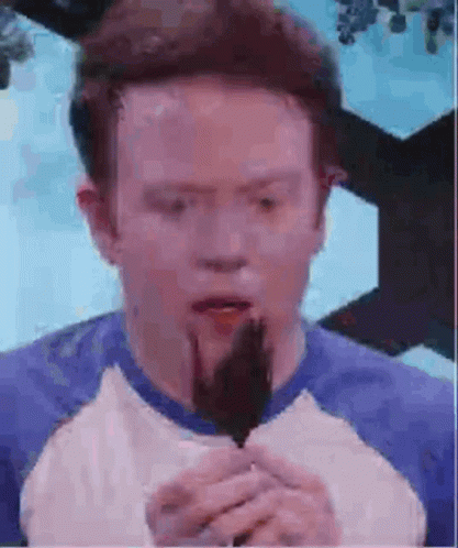Man In Blue Shirt Eating Ice Cream GIF