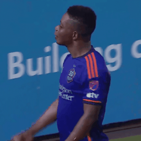 Man In Blue Shirt Giving Middle Finger GIF