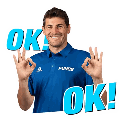 Man in Blue Shirt Giving OK Sign