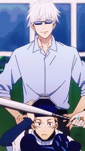 Man in Blue Shirt Holding Bat Over Another