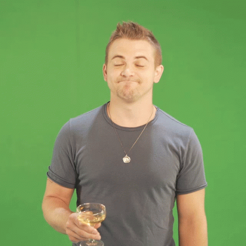Man In Blue Shirt Holding Glass Of Wine GIF