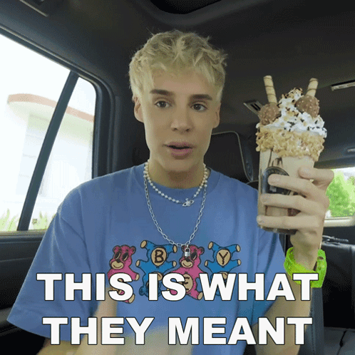 Man In Blue Shirt Holding Milkshake This Is What They Meant GIF