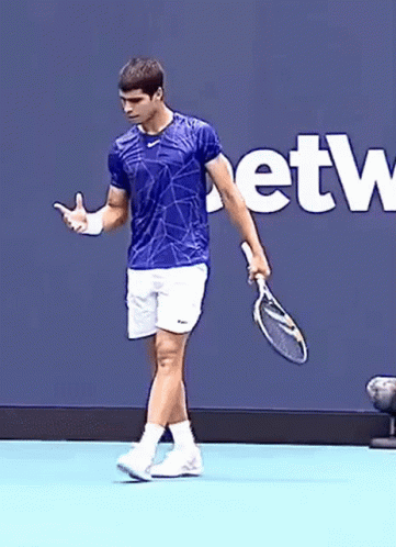 Man In Blue Shirt Holding Tennis Racket Saying Etw GIF