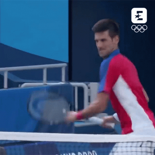 Man in Blue Shirt Holding Tennis Racquet Eurosport Logo
