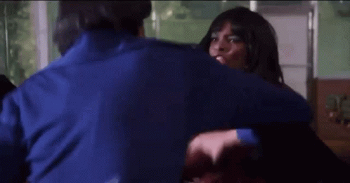 Man In Blue Shirt Holding Woman In Blue Shirt GIF