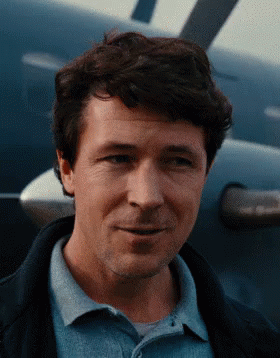 Man In Blue Shirt In Front Of Plane GIF