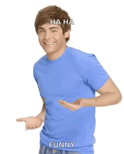 Man in Blue Shirt Laughing and Pointing Saying Ha Ha Funny