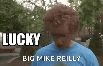 Man In Blue Shirt Looking Down Eyes Closed GIF
