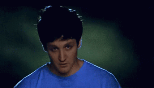 Man In Blue Shirt Making A Face GIF