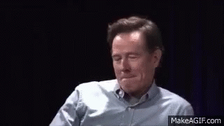 Man in Blue Shirt Making Funny Face and Waving
