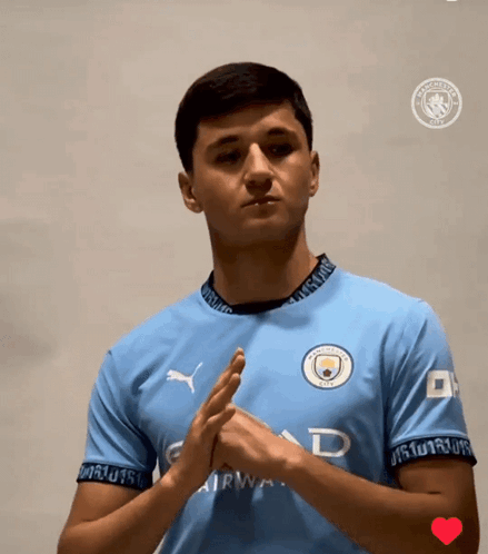 Man in Blue Shirt Manchester City