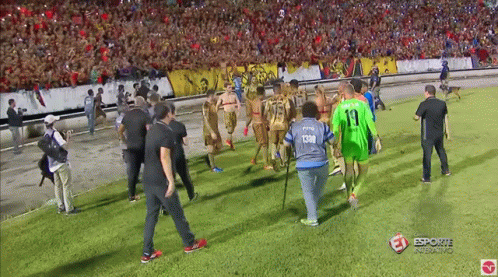 Man in Blue Shirt Number 13