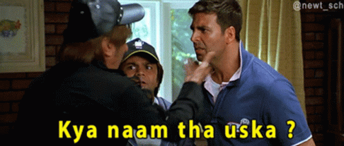 Man in Blue Shirt Pointing at Another Man Kya Naam Tha Uska