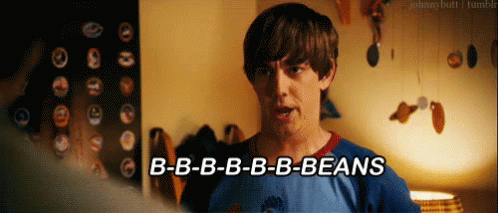 Man in Blue Shirt Saying Beans