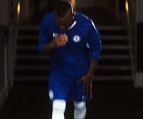 Man in Blue Shirt Saying Chelsea