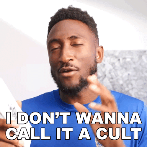 Man in Blue Shirt Saying I Don't Wanna Call It a Cult