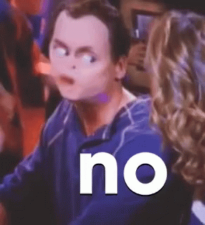 Man in Blue Shirt Saying No