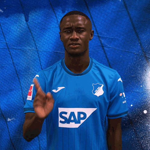 Man in Blue Shirt Saying Sap