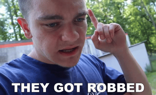Man in Blue Shirt Saying They Got Robbed