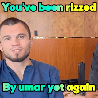 Man In Blue Shirt Saying You've Been Rizzed By Umar Yet Again GIF