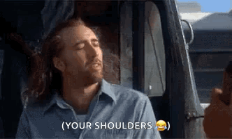 Man In Blue Shirt Saying Your Shoulders In Truck GIF