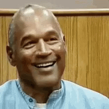 Man in Blue Shirt Smiling