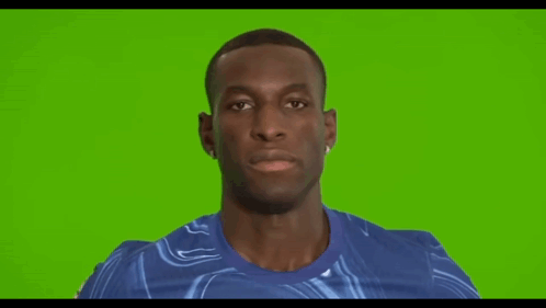 Man in Blue Shirt Smiling