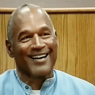 Man in Blue Shirt Smiling