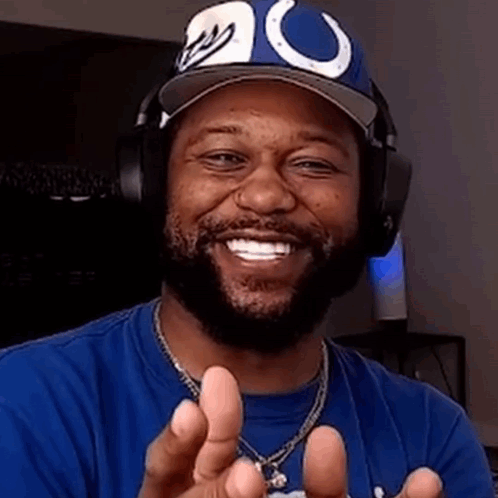 Man In Blue Shirt Smiling Peace Sign GIF