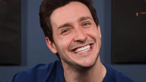 Man in Blue Shirt Smiling