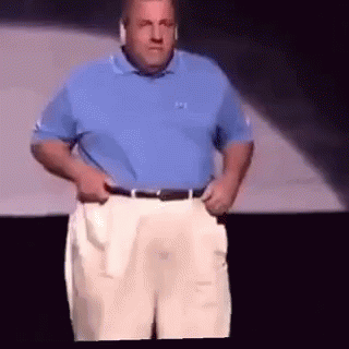Man In Blue Shirt Wearing Headphones GIF
