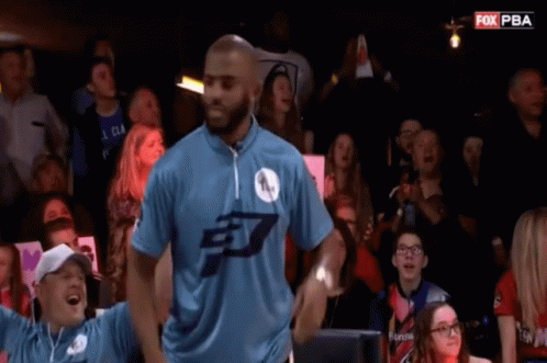 Man in Blue Shirt with E7