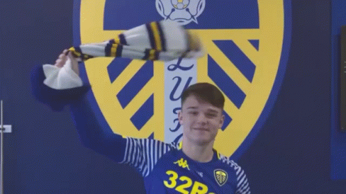 Man in Blue Shirt With Number 32