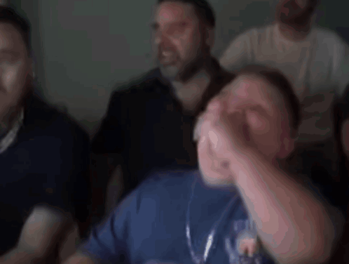 Man in Blue Shirt With Nurse