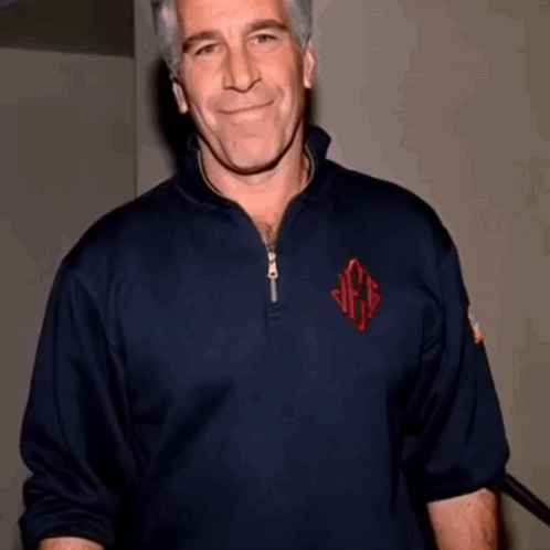 Man in Blue Shirt with Red VFD Monogram