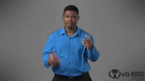 Man In Blue Shirt With Sign Saying With Words GIF