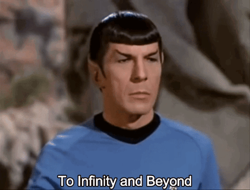 Man in Blue Shirt with To Infinity and Beyond