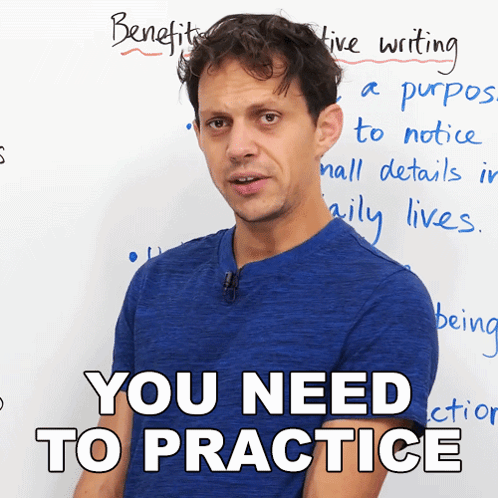 Man in Blue Shirt with White Board Saying Benefits Creative Writing