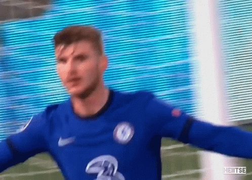 Man in Blue Soccer Jersey
