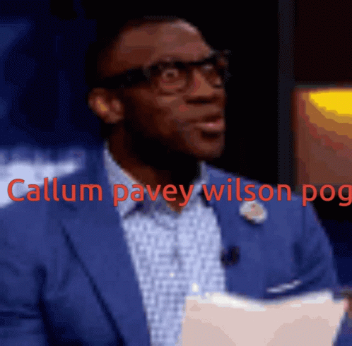Man in Blue Suit and Glasses Callum Pavey Wilson Pog