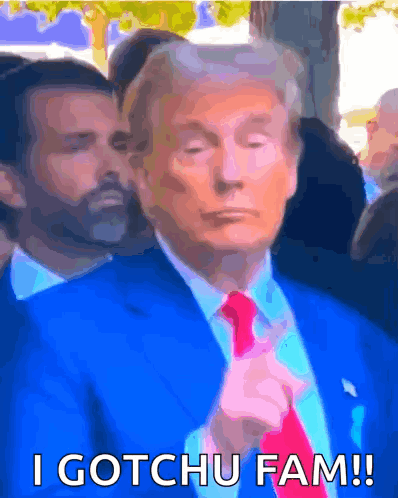 Man in Blue Suit and Red Tie Says I Gotchu Fam