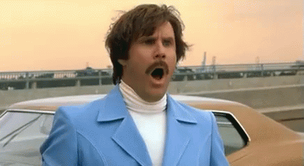 Man in Blue Suit Making Funny Face