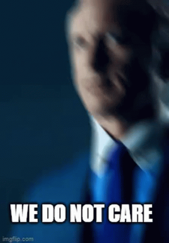 Man in Blue Suit Making Funny Face