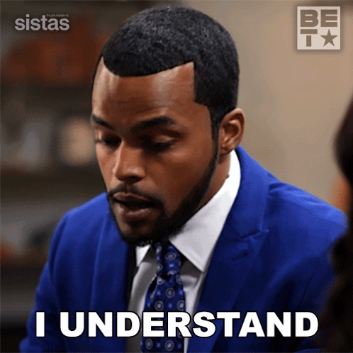 Man in Blue Suit Saying I Understand