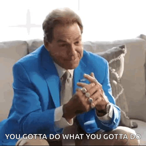 Man in Blue Suit Says You Gotta Do What You Gotta Do