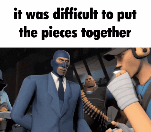 Man in Blue Suit Talking to Man in Mask