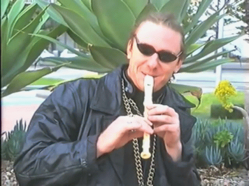 Man in Blue Sunglasses Taking Selfie