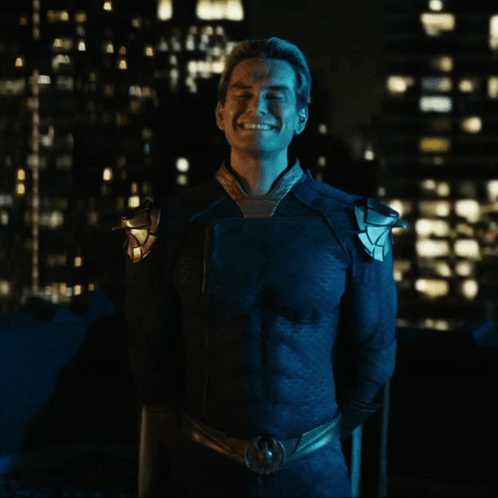 Man in Blue Superhero Costume Smiling