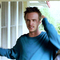 Man in Blue Sweater on Porch